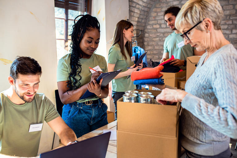 Volunteers packing supplies on the campus of UNC Pembroke